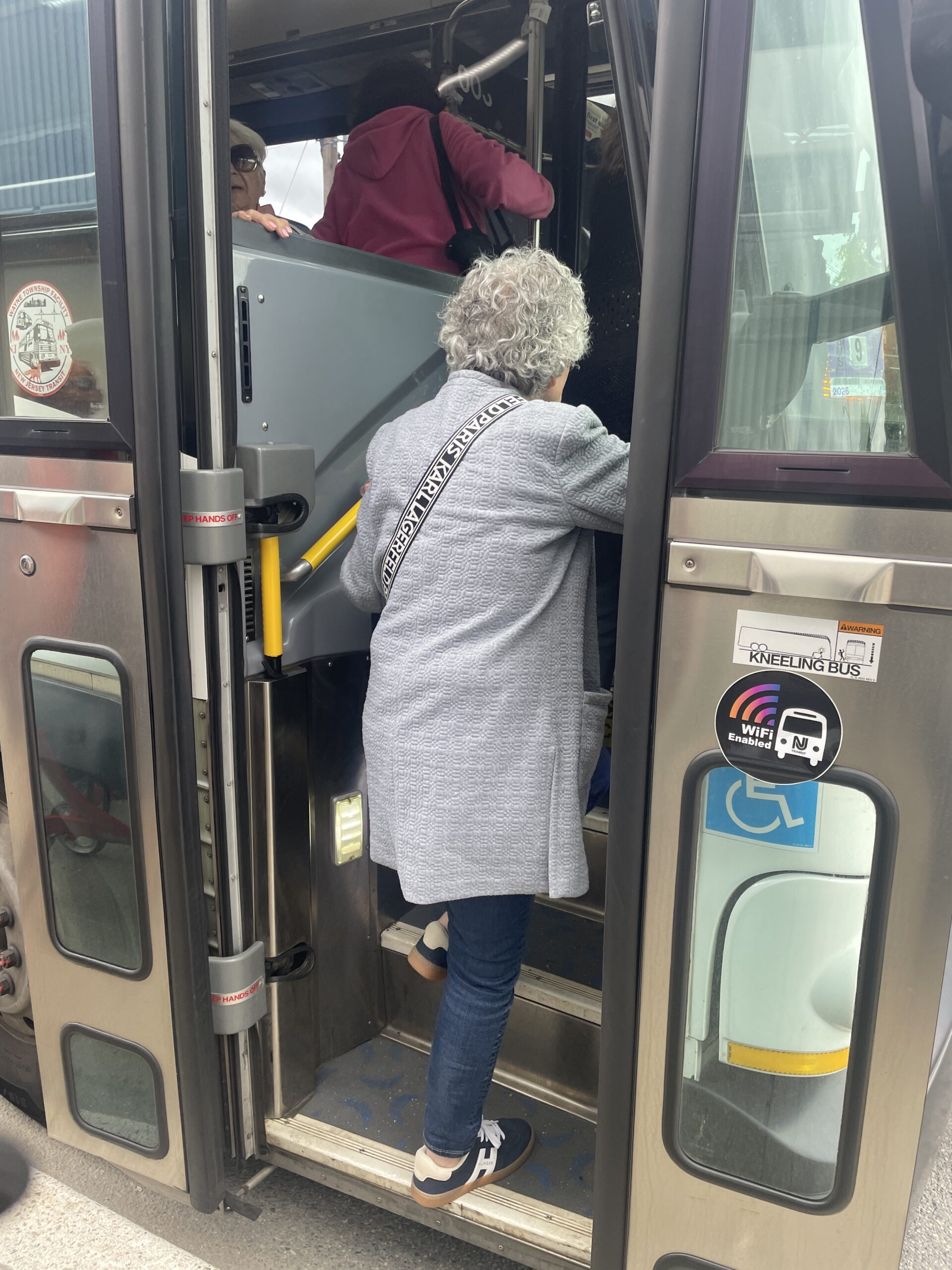 A senior in Wayne boarding an NJ Transit bus